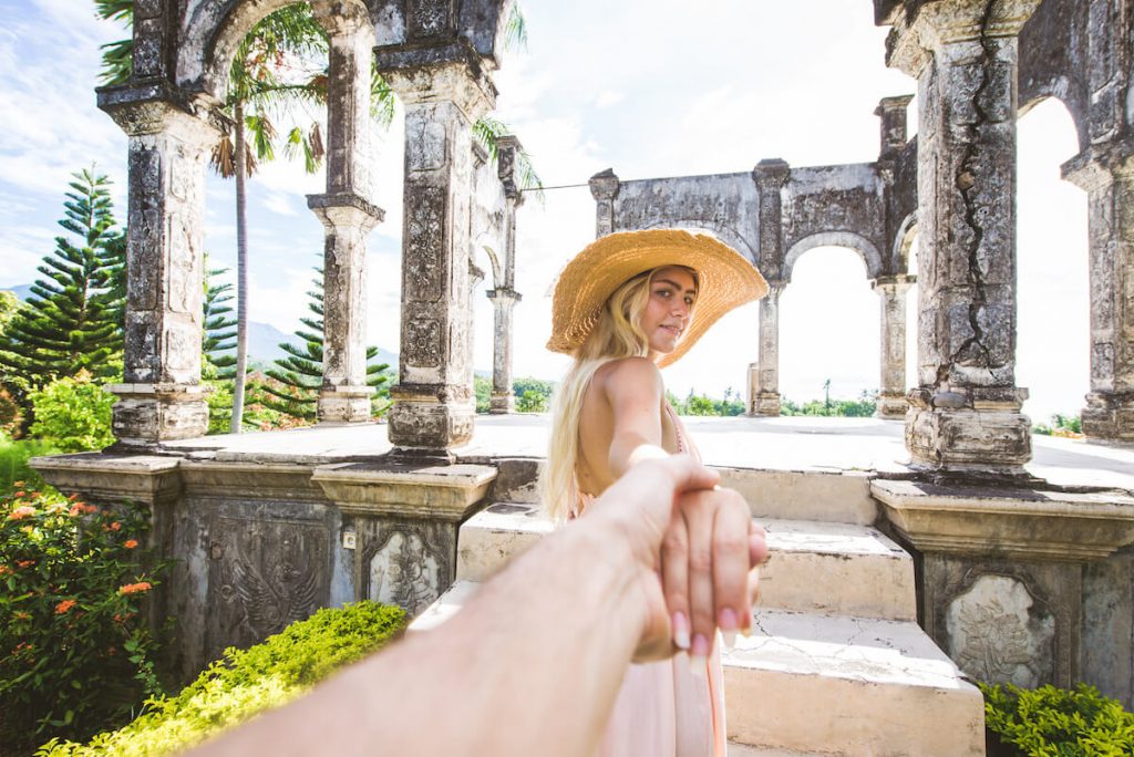 What is a brand ambassador: woman holding the hand of the person taking her photo