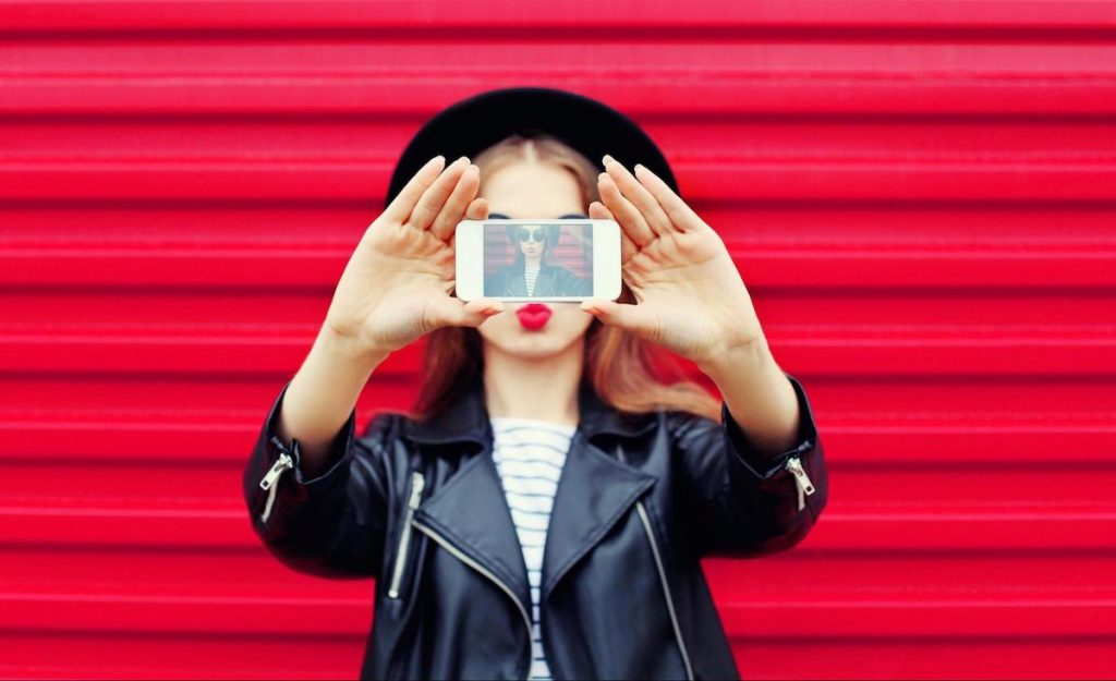 instagram influencer taking a selfie